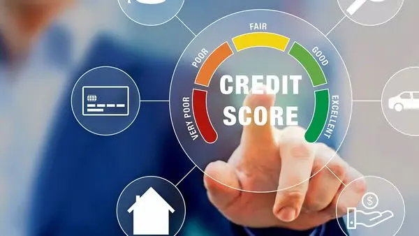Businessman in suit showing credit score meter on screen