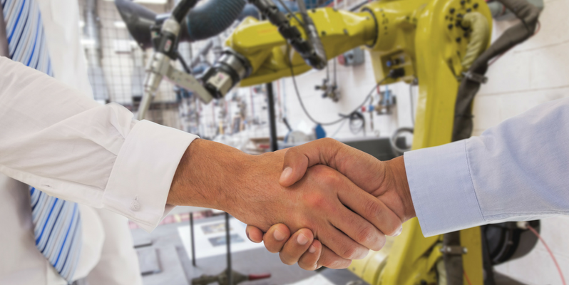 business owner machinery loan handshake factory