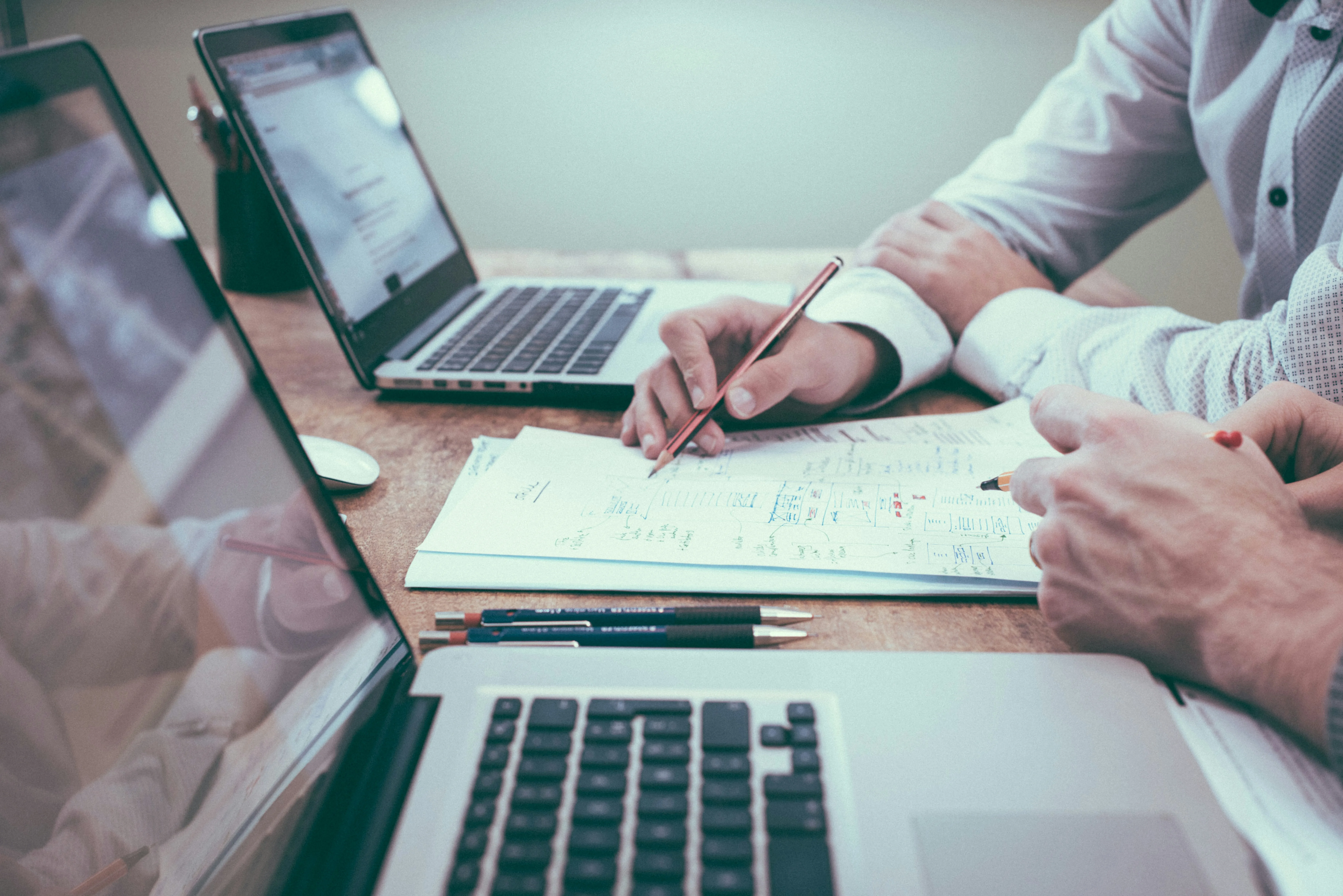 Professional businessman working at desk with laptop